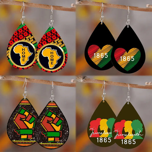 Set of four pairs of earrings with various designs and text on a blurred background.